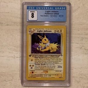 Pokemon Light Jolteon 1st Edition 2002 Neo Destiny 48/105 CGC 8 Graded Card TCG